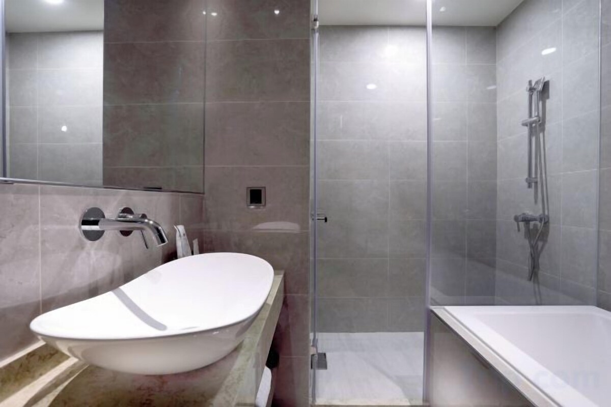 Hair dryer, slippers, towels