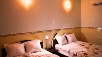 Twin Room, Pool View | In-room safe, individually decorated, individually furnished, free WiFi