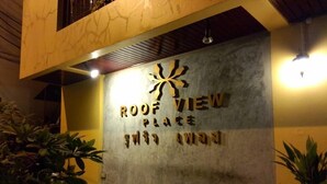 A sign with "ROOF VIEW PLACE" and a stylized sun design. - Roof View Place (Bangkok)