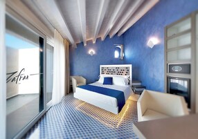 Deluxe Suite | Pillowtop beds, minibar, in-room safe, individually decorated