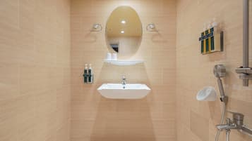 Shower, hair dryer, slippers, towels