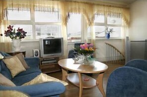 42-inch flat-screen TV with cable channels, TV, DVD player - Our Home Apartments (Stykkisholmur)