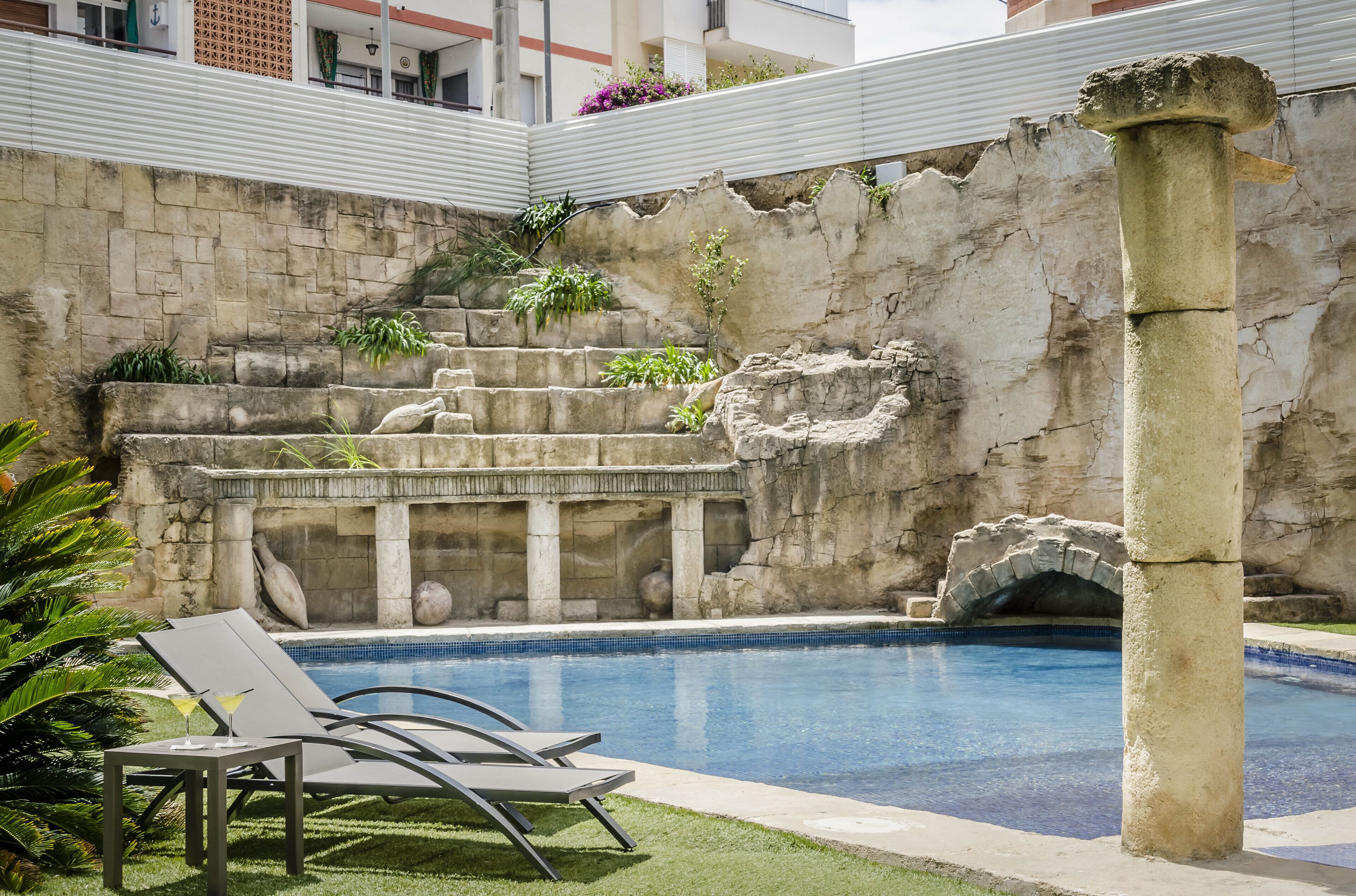 indoor pool, seasonal outdoor pool, pool umbrellas, pool loungers