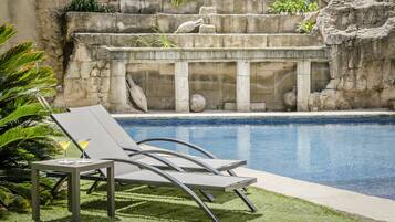 Indoor pool, seasonal outdoor pool, pool umbrellas, sun loungers