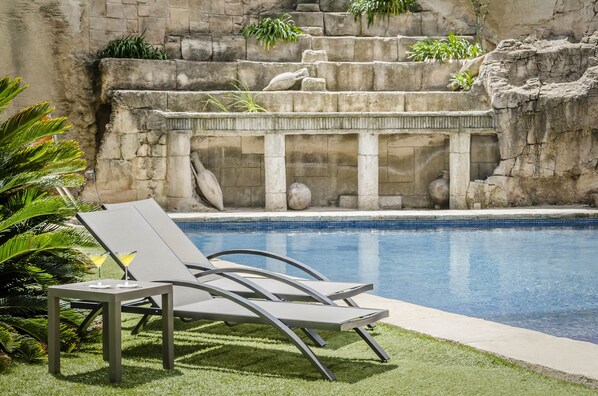 Indoor pool, seasonal outdoor pool, pool umbrellas, pool loungers