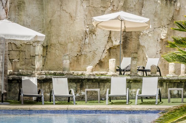 Indoor pool, seasonal outdoor pool, pool umbrellas, sun loungers