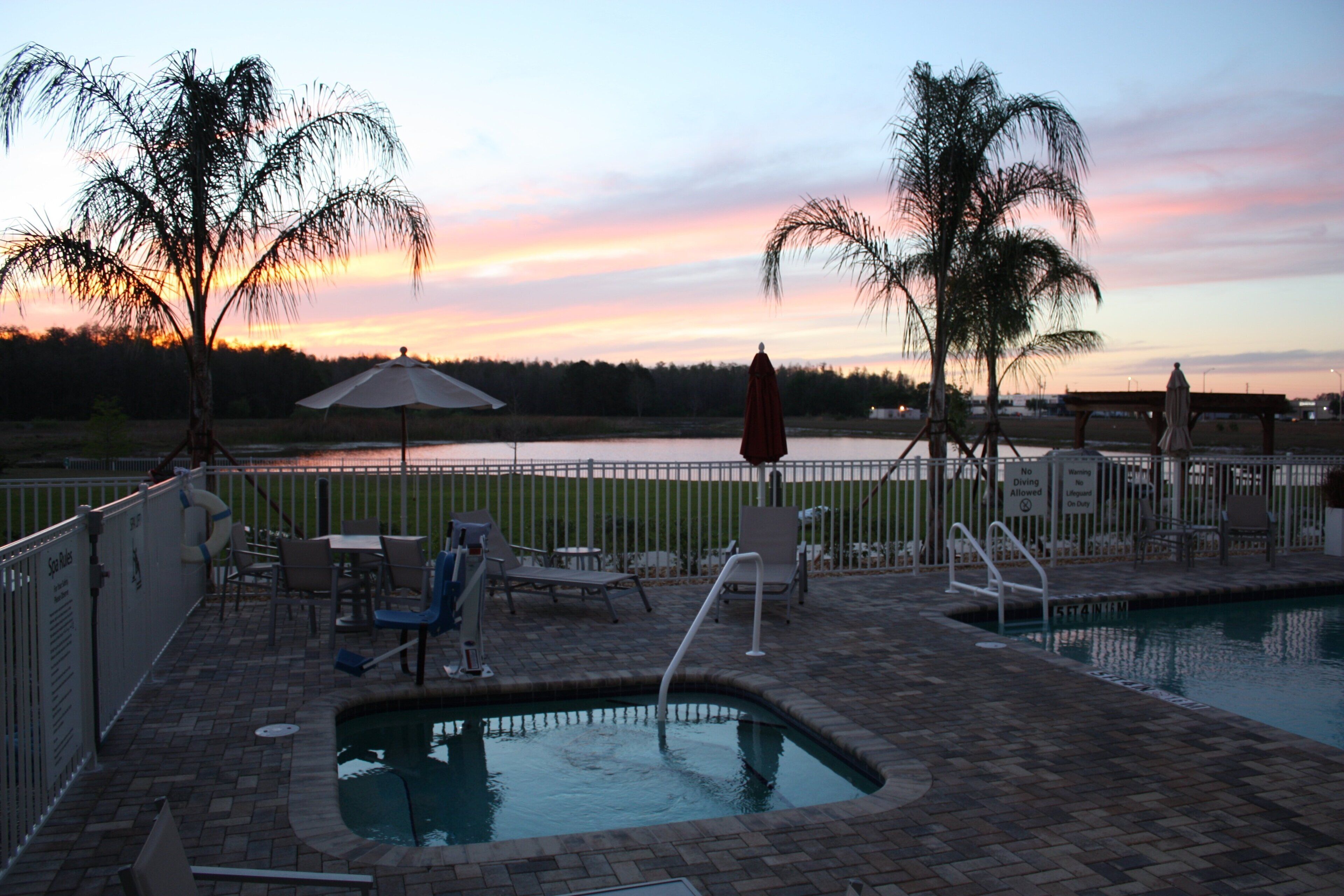 outdoor pool, pool umbrellas, pool loungers