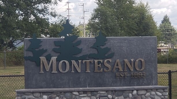 A sign with the word "Montesano" and "EST. 1883" indicating the establishment year.
