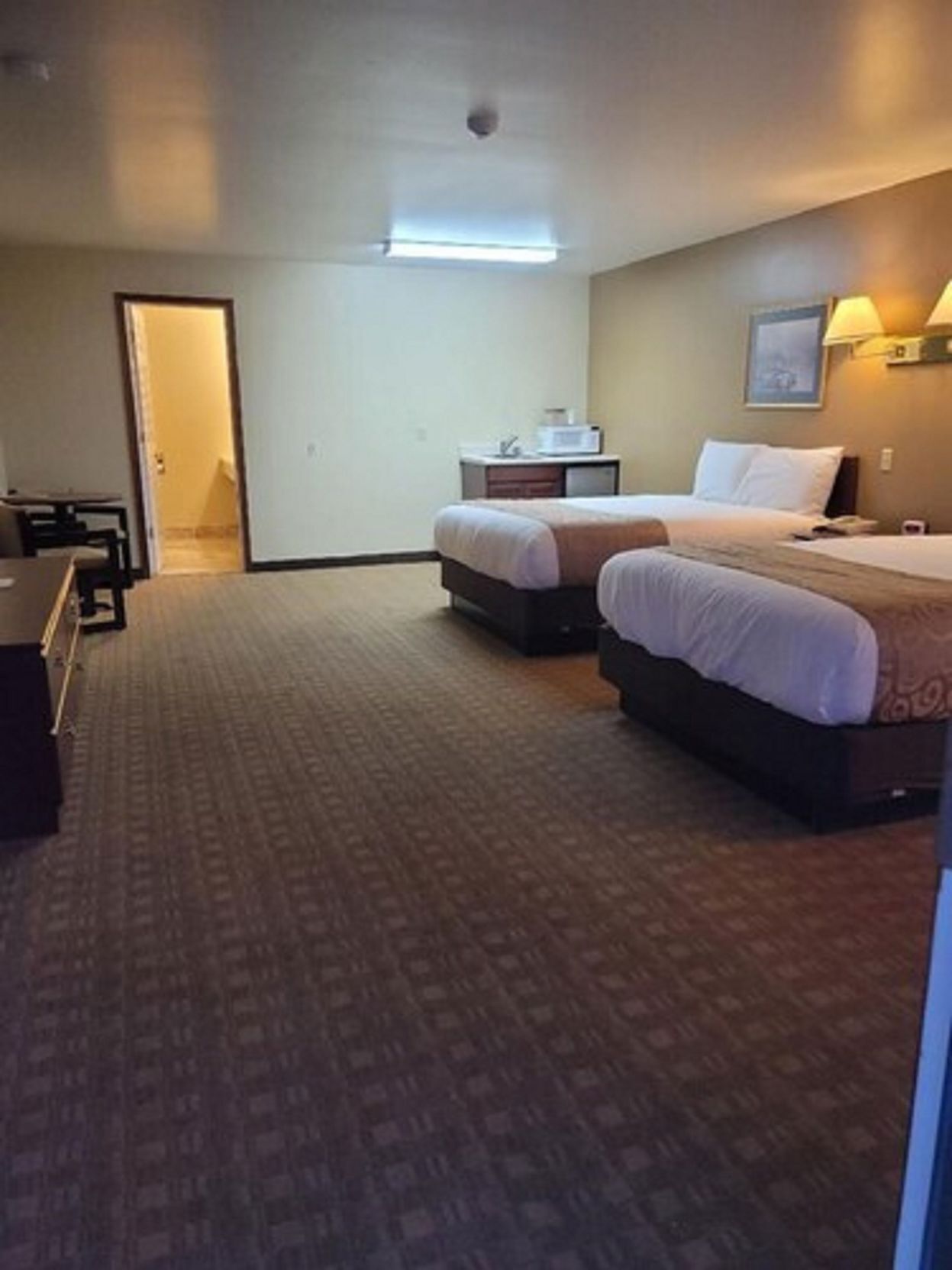 Premium bedding, desk, blackout curtains, iron/ironing board