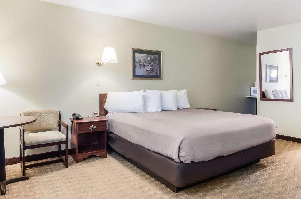 Premium bedding, desk, blackout curtains, iron/ironing board
