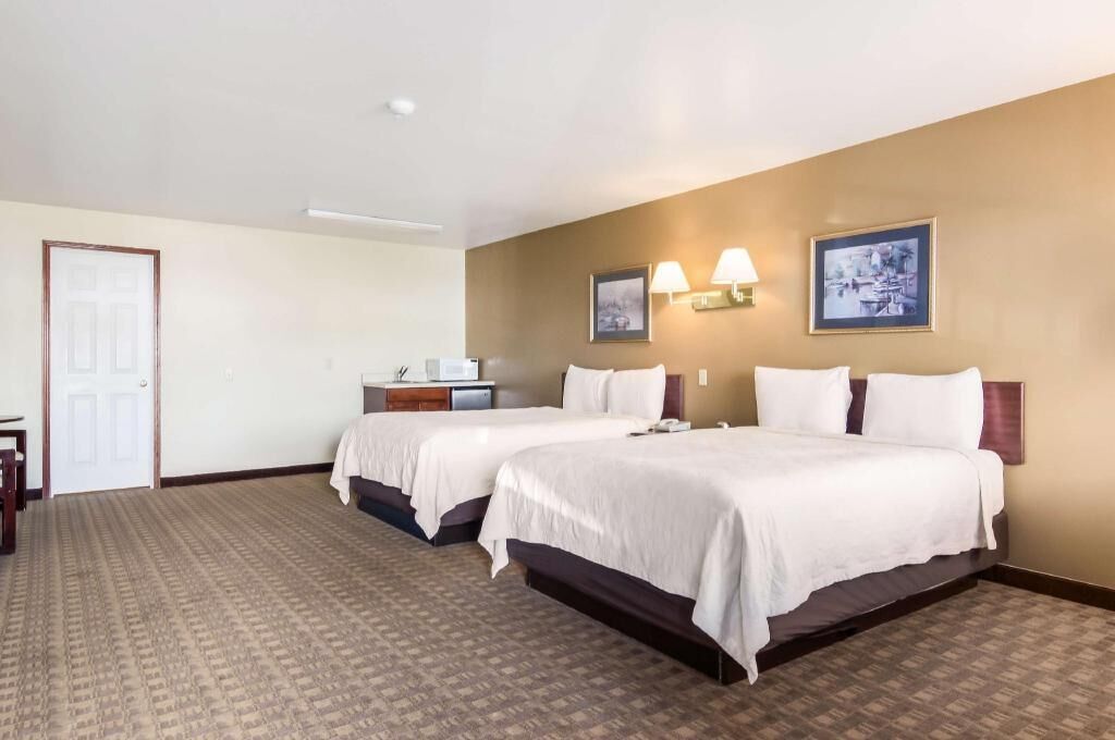 Premium bedding, desk, blackout curtains, iron/ironing board