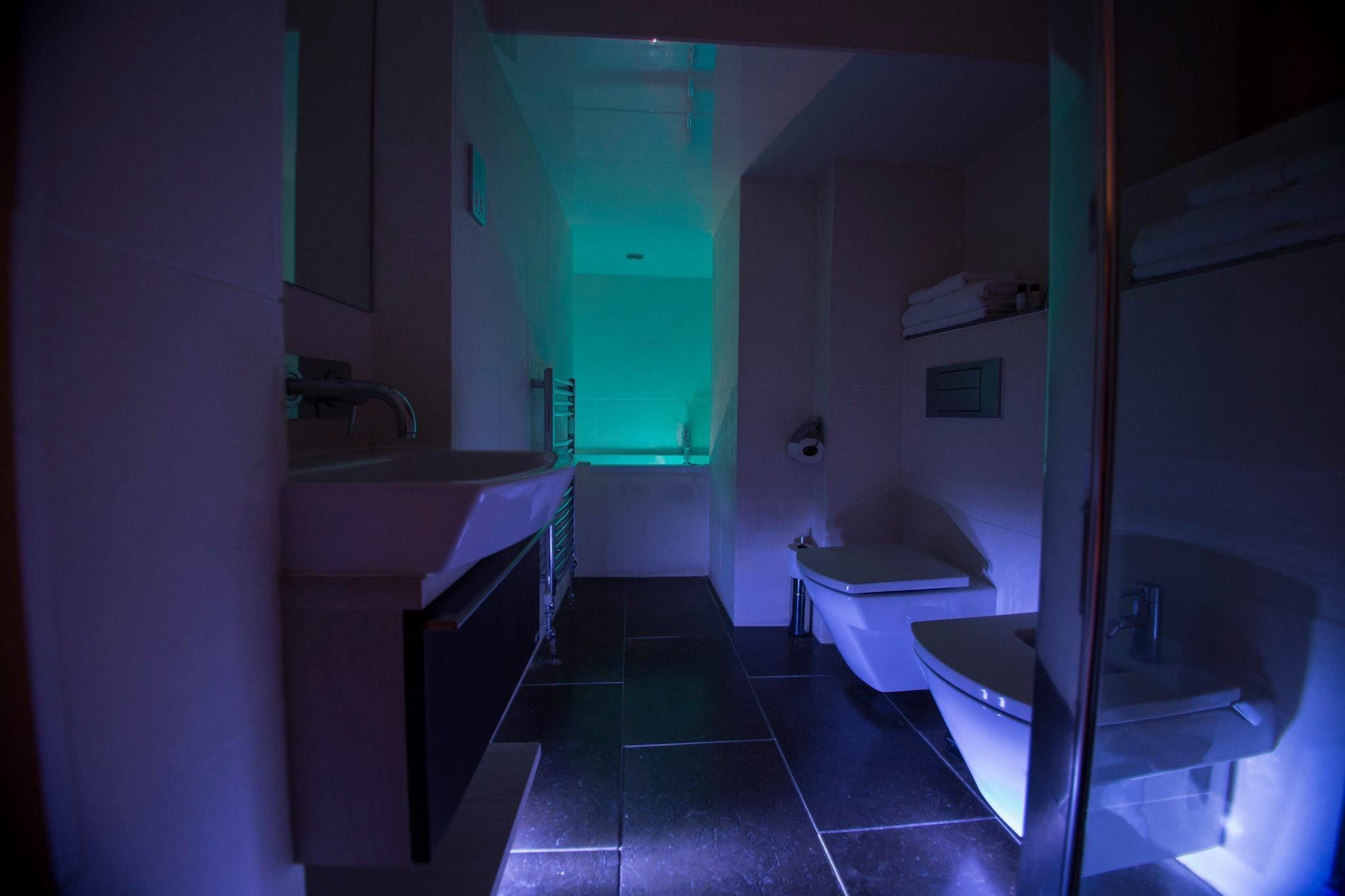 honeymoon suite (four poster) | bathroom | designer toiletries, hair dryer, towels