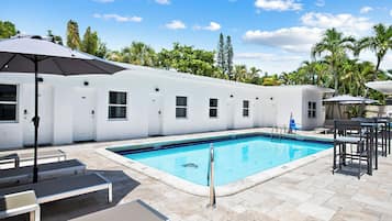 Outdoor pool, open 9:00 AM to 7:00 PM, pool umbrellas, sun loungers