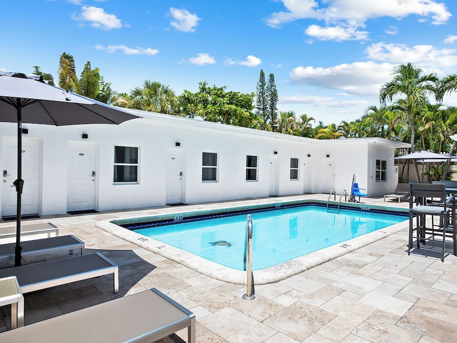 Outdoor pool, open 9:00 AM to 7:00 PM, pool umbrellas, sun loungers