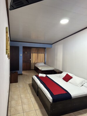 Comfort Quadruple Room, Multiple Beds | 1 bedroom, blackout curtains, free WiFi, bed sheets