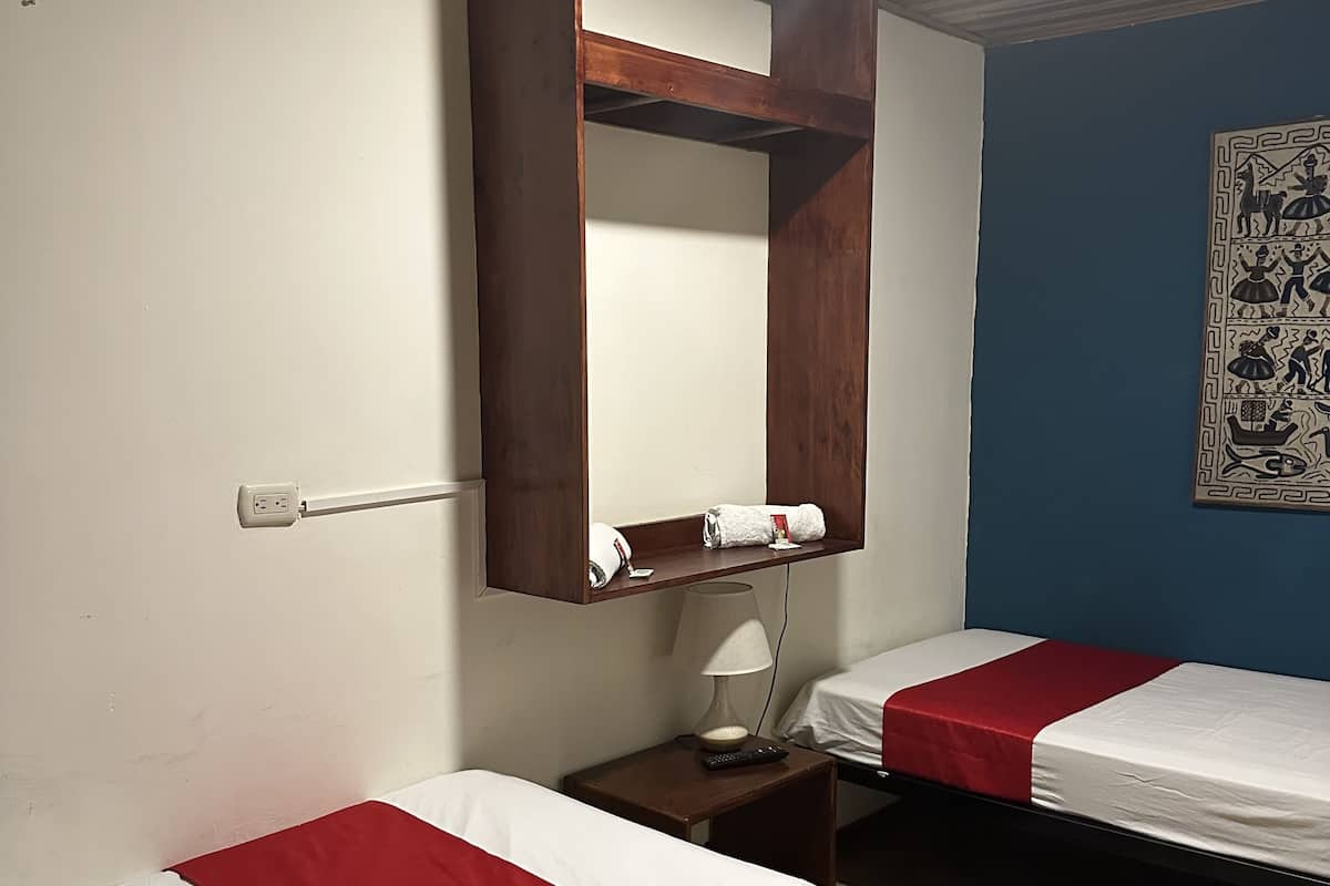 Economy Double Room, 2 Twin Beds | 1 bedroom, blackout drapes, free WiFi, bed sheets