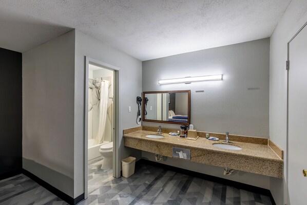 Hair dryer, towels, soap, shampoo