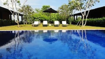 2 outdoor pools, pool umbrellas, pool loungers