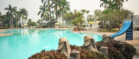 Outdoor pool, open 9 AM to 9 PM, pool umbrellas, pool loungers