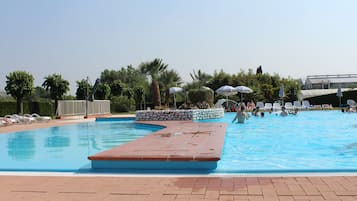 Outdoor pool, open 7:00 AM to 9:00 PM, pool umbrellas, pool loungers
