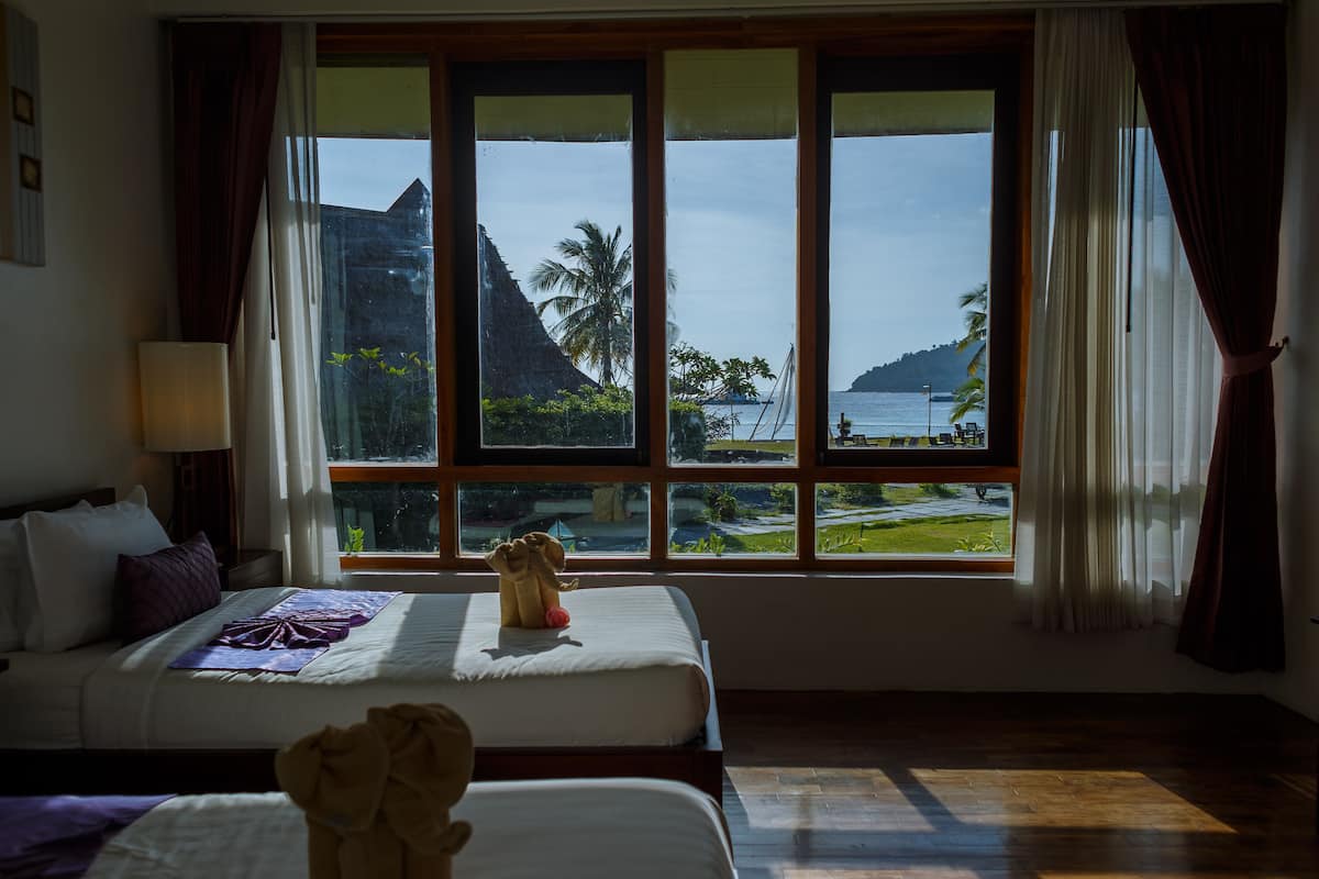 family suite, 2 bedrooms, non smoking, sea view | 1 bedroom, premium bedding, minibar, in-room safe