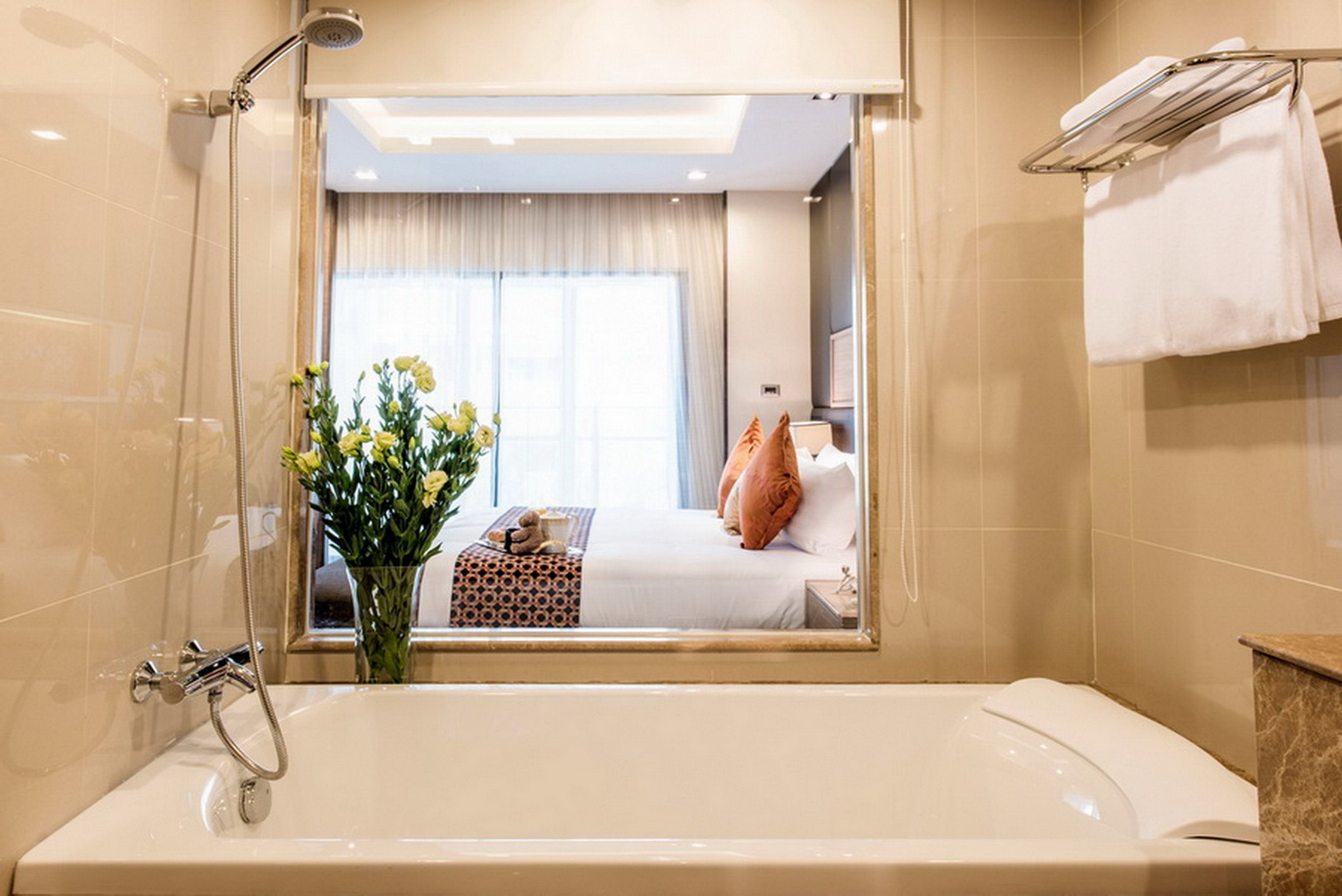 two bedroom deluxe | bathroom | separate bathtub and shower, deep-soaking bathtub, free toiletries