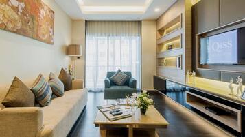 Two Bedroom Premier (140Sqm) | Living room | 40-inch LED TV with cable channels, TV, DVD player