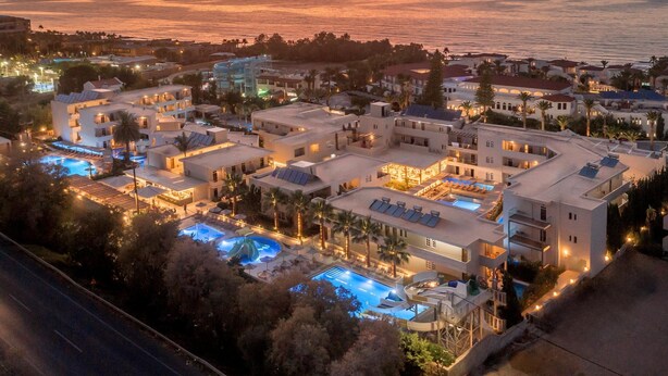 A resort with multiple swimming pools, a beachfront view, and a variety of building styles. - Zeus Hotels YDORIA RESORT - All Inclusive (Rethymno)