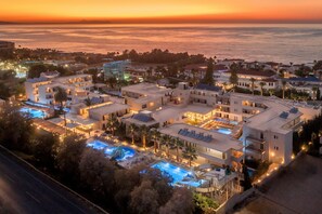 A resort with multiple swimming pools, a beachfront view, and a variety of building styles. - Zeus Hotels YDORIA RESORT - All Inclusive (Rethymno)