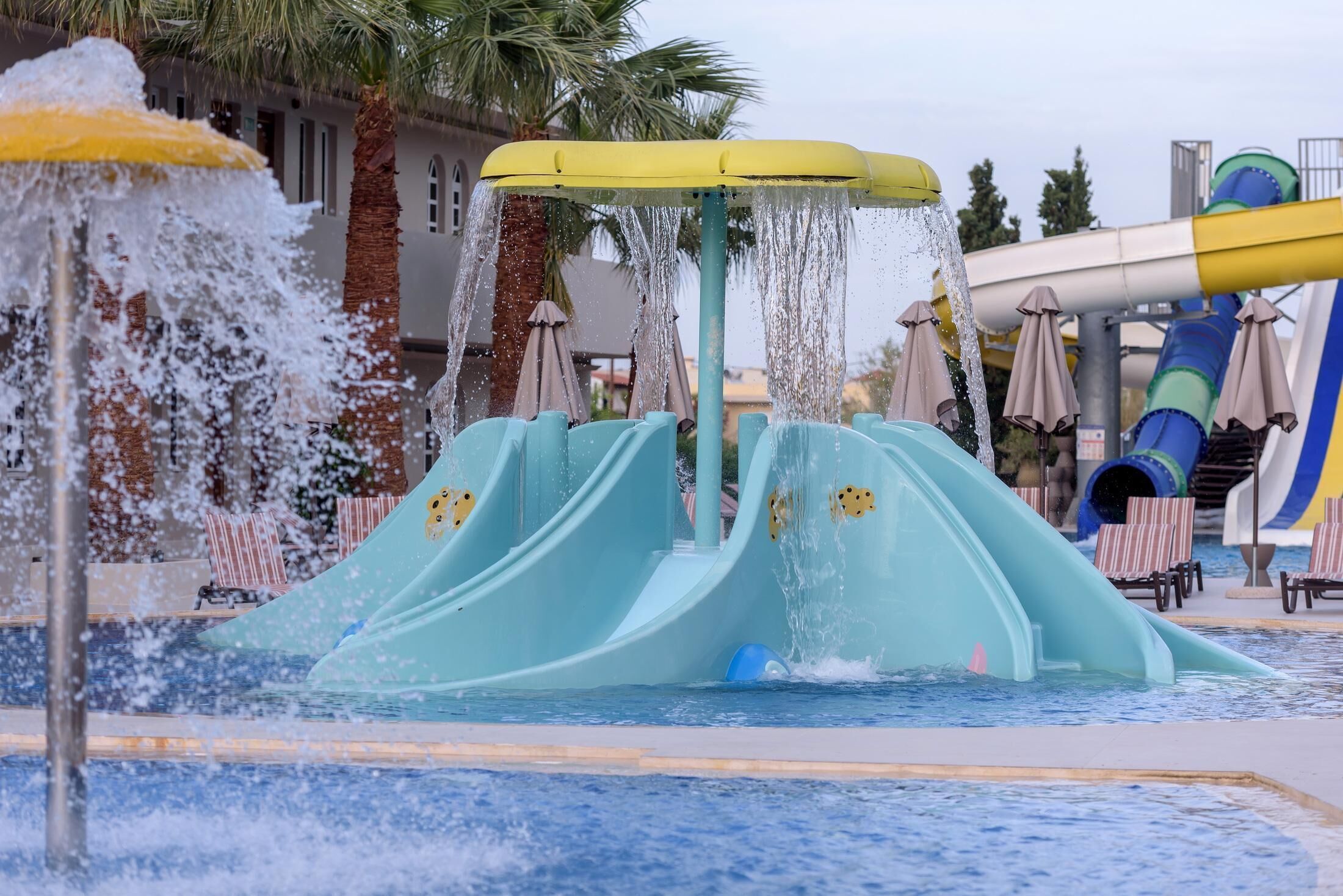 A water park with multiple slides and water features.