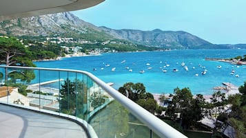 Suite, 1 habitación, vista al mar | Ropa de cama de alta calidad y minibar