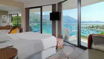 Suíte, 1 quarto, vista para o mar | Roupas de cama premium, frigobar, cofres nos quartos, escrivaninha