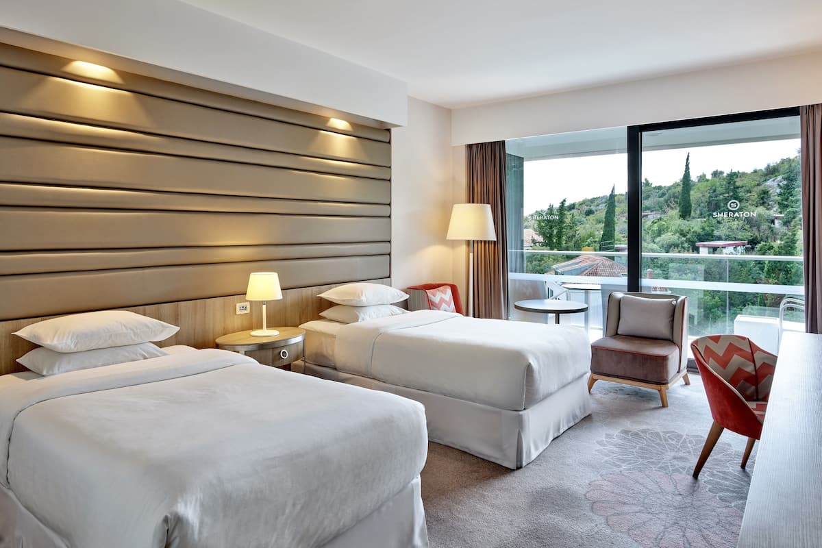 superior twin room, 2 single beds, non smoking, partial sea view | premium bedding, minibar, in-room safe, desk