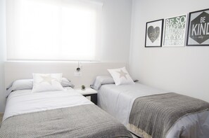 Desk, blackout curtains, iron/ironing board, cots/infant beds