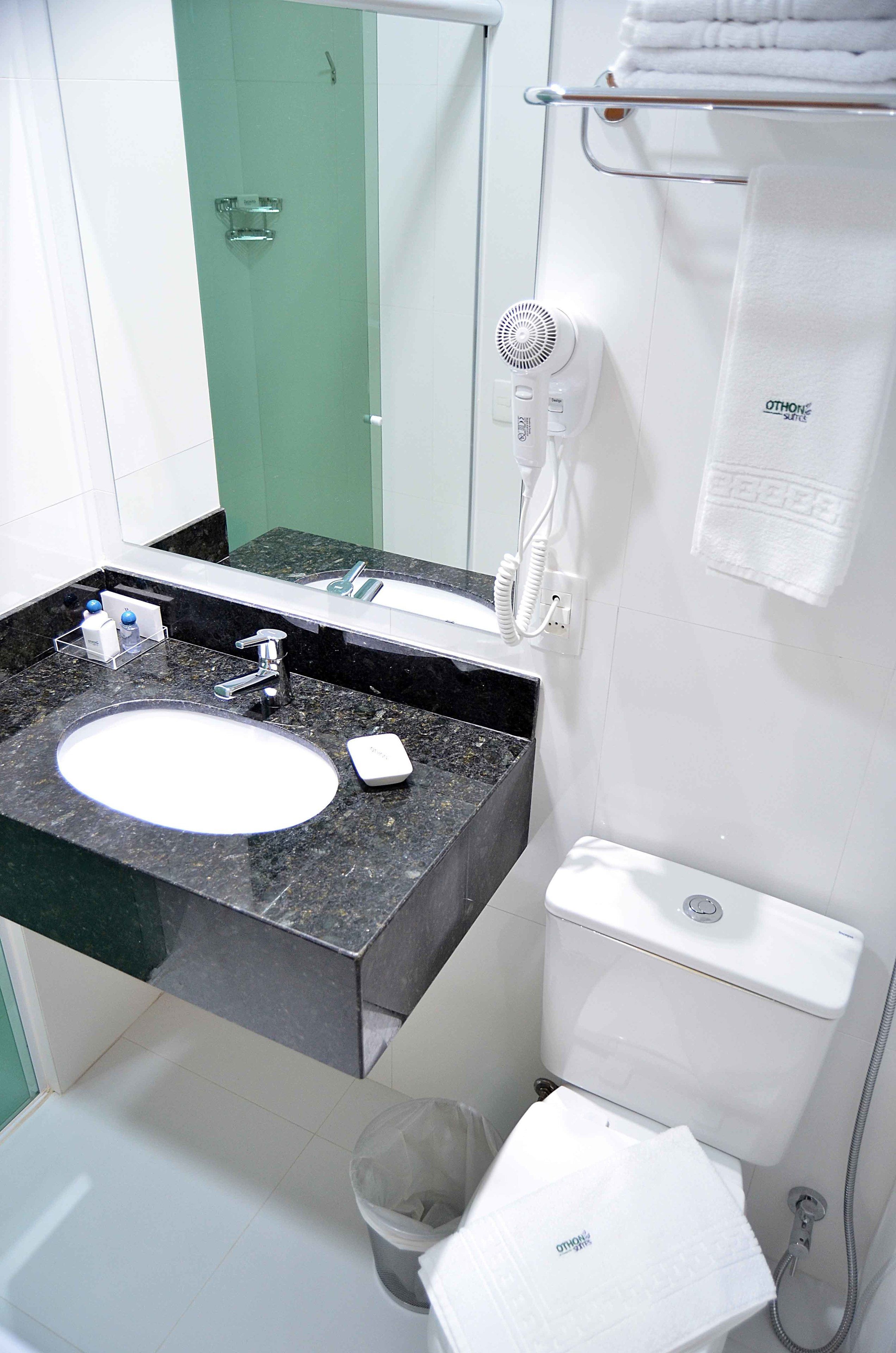 shower, rainfall showerhead, eco-friendly toiletries, towels