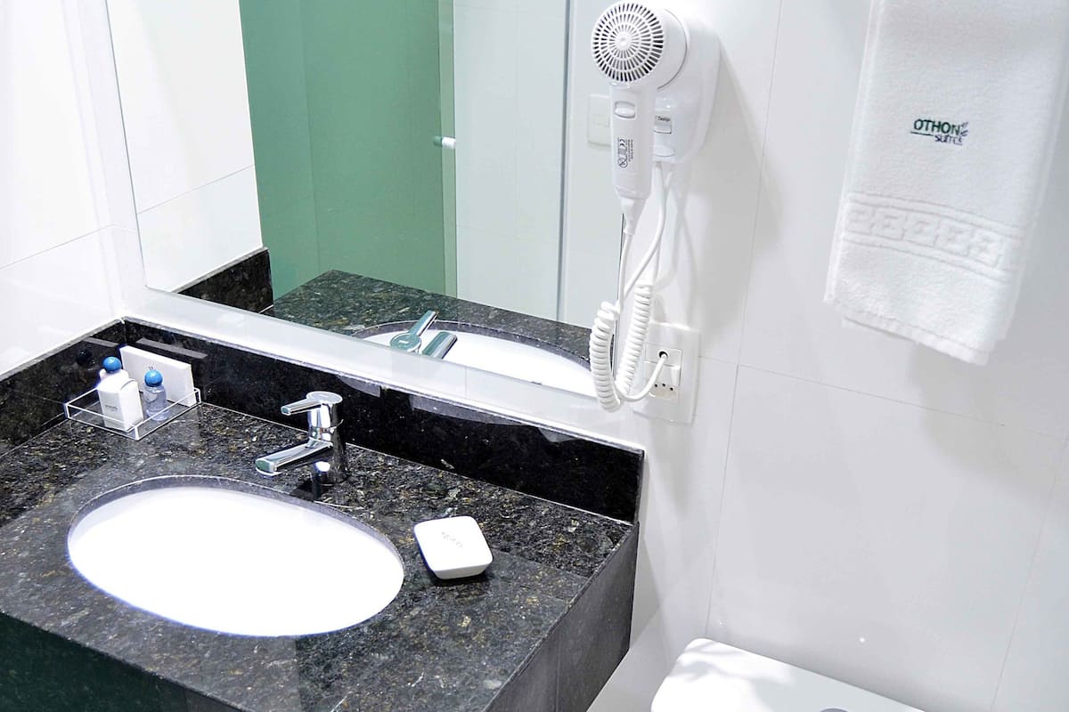 shower, rainfall showerhead, eco-friendly toiletries, towels