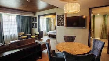 King Suite, Room | Premium bedding, in-room safe, desk, blackout curtains