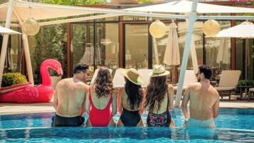 Outdoor pool, open 6:00 AM to 9:00 PM, cabanas (surcharge)