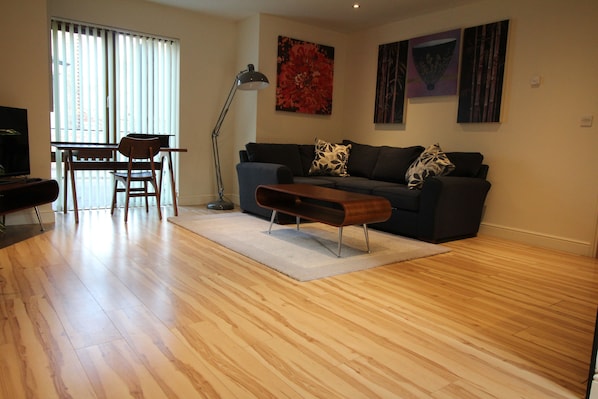 Superior Apartment, 1 Bedroom, Patio, Ground Floor | Living area | Flat-screen TV