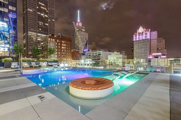 Outdoor pool, open 8:00 AM to 10:00 PM, sun loungers