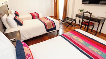 Triple Room | Premium bedding, down comforters, in-room safe, individually decorated