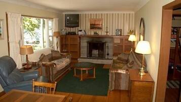 3 Bedroom Waterfront Cottage | Living area | TV, DVD player