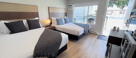 Habitación, 2 camas Queen size, vista al jardín | Ropa de cama de alta calidad, edredón y camas con pillow-top