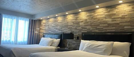 Desk, blackout curtains, iron/ironing board, rollaway beds