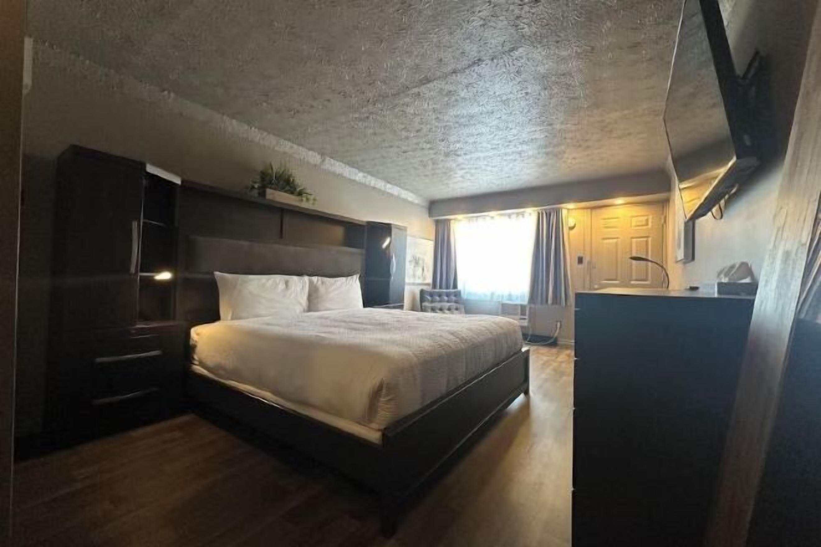 Desk, blackout curtains, iron/ironing board, rollaway beds