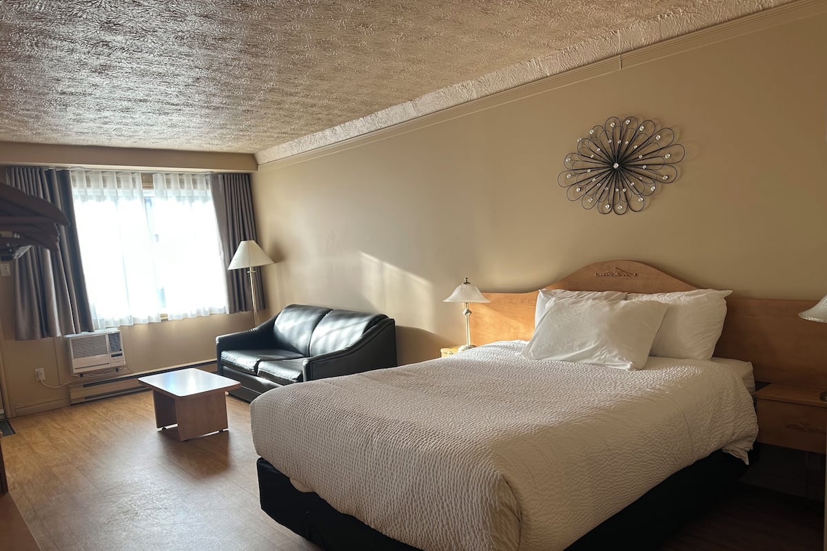 Desk, blackout drapes, iron/ironing board, rollaway beds