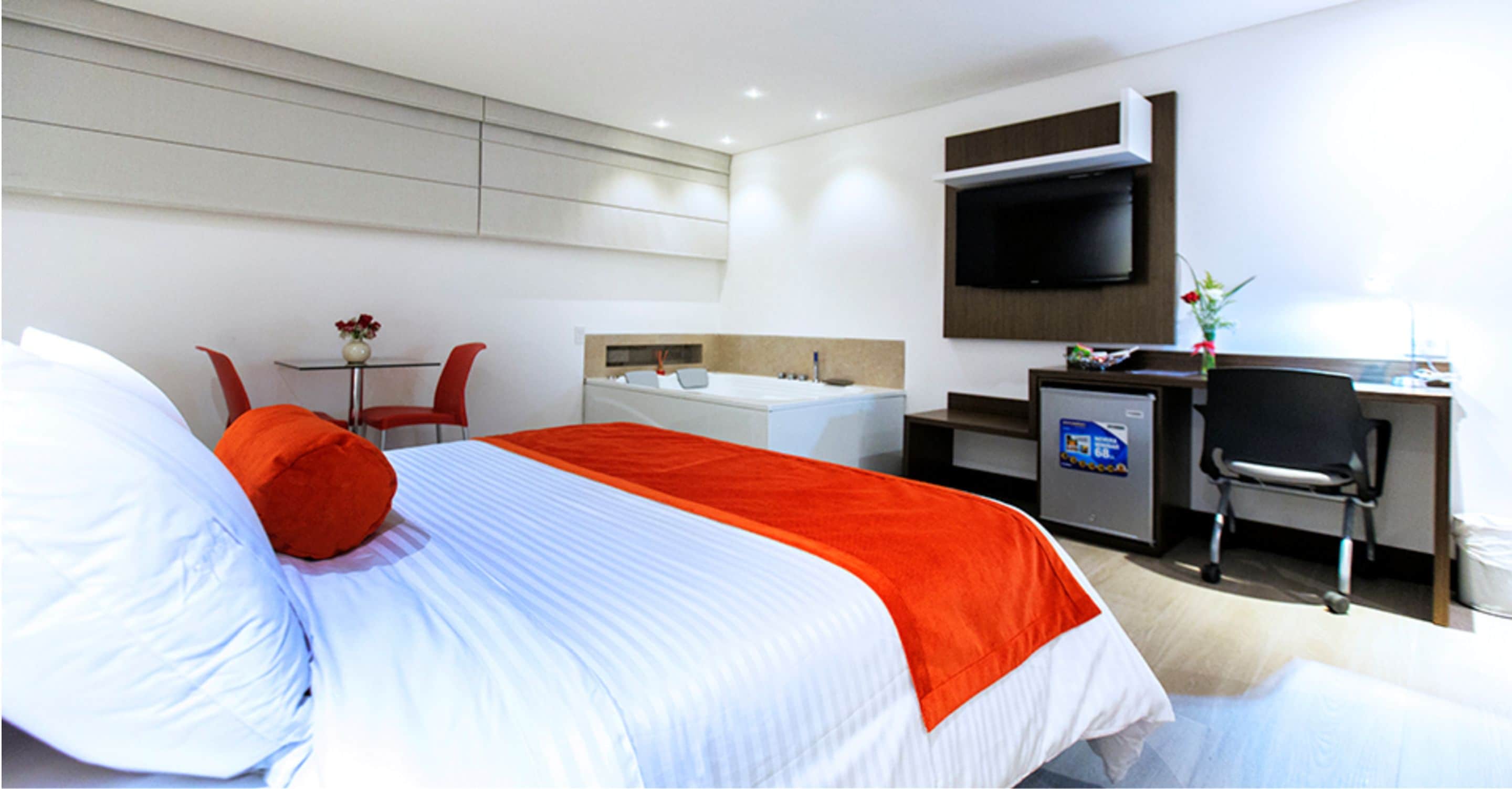 Habitación ejecutiva | Ropa de cama de alta calidad y minibar 