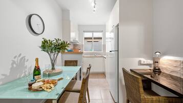 Two Bedroom Apartment | Private kitchen | Full-sized fridge, microwave, oven, stovetop