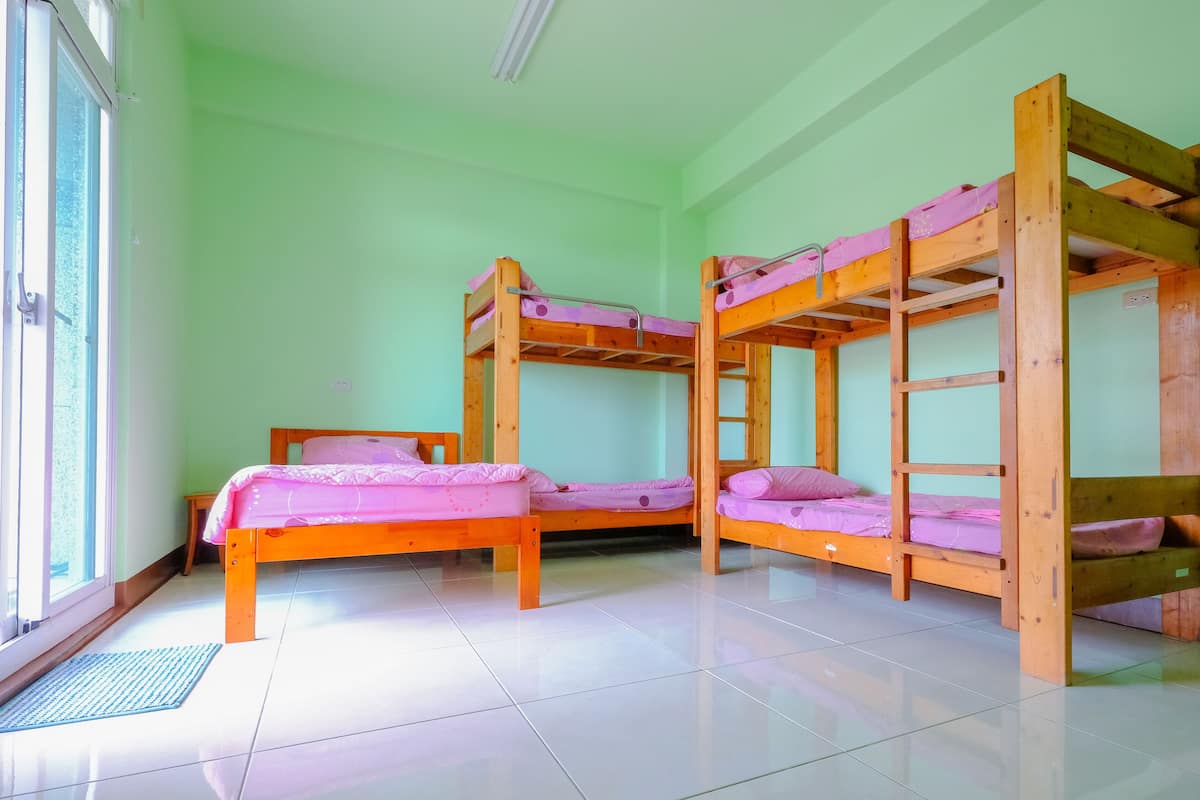 Family Room | Premium bedding, laptop workspace, blackout drapes, soundproofing