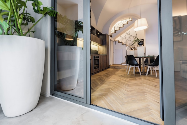 Departamento Deluxe | Área de sala de estar | Televisión LCD